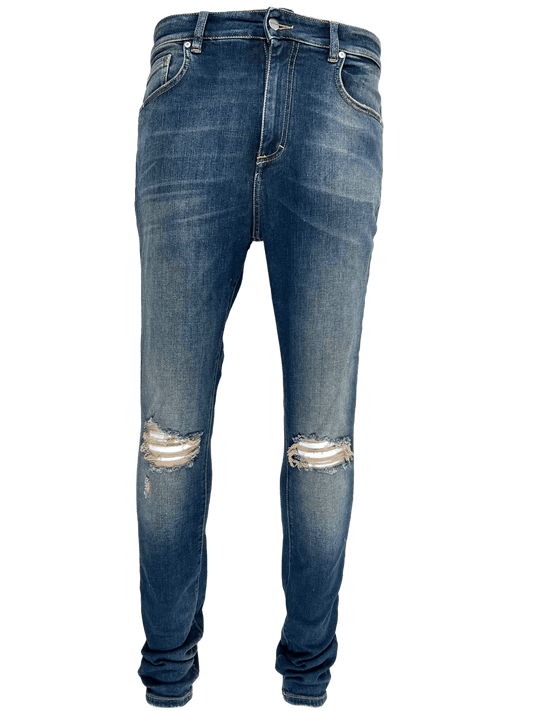 A pair of REPRESENT men's skinny jeans with holes on the knees.