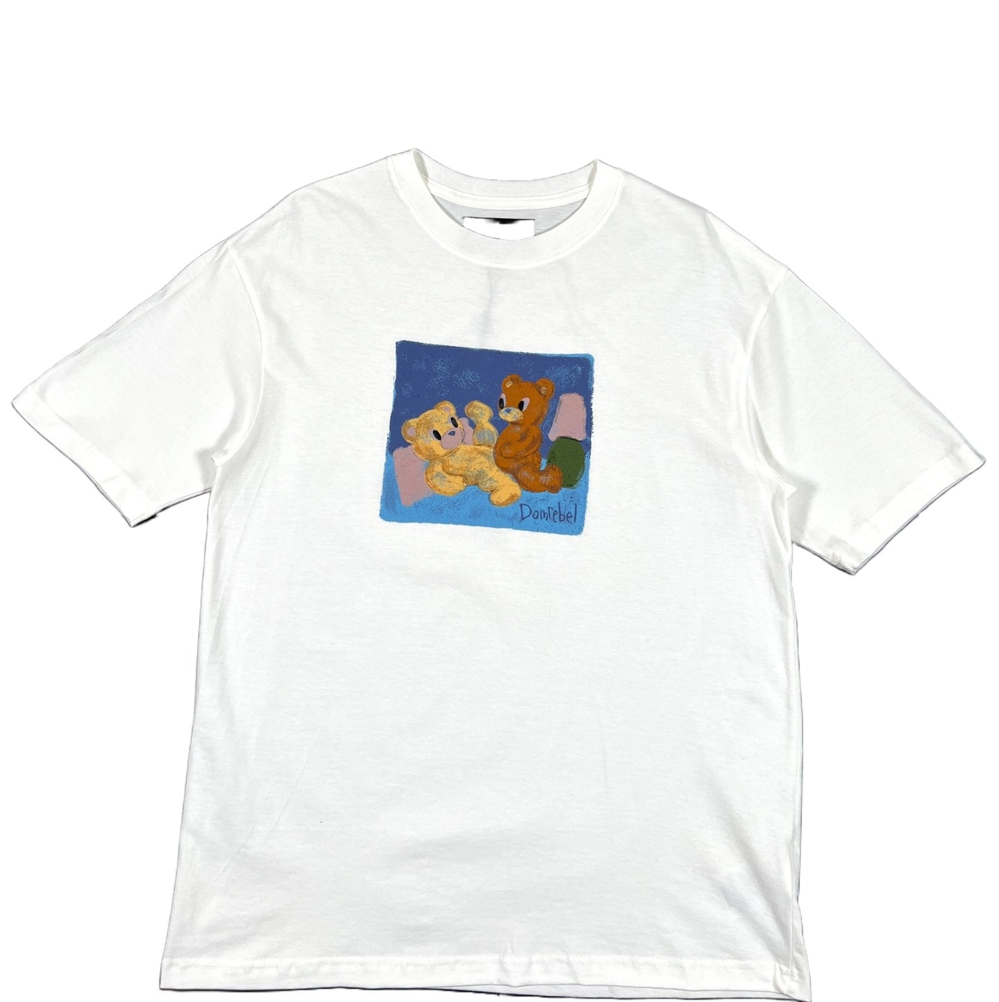 A Dom Rebel Nookie T-shirt Ivory with a graphic cartoon bear on it.