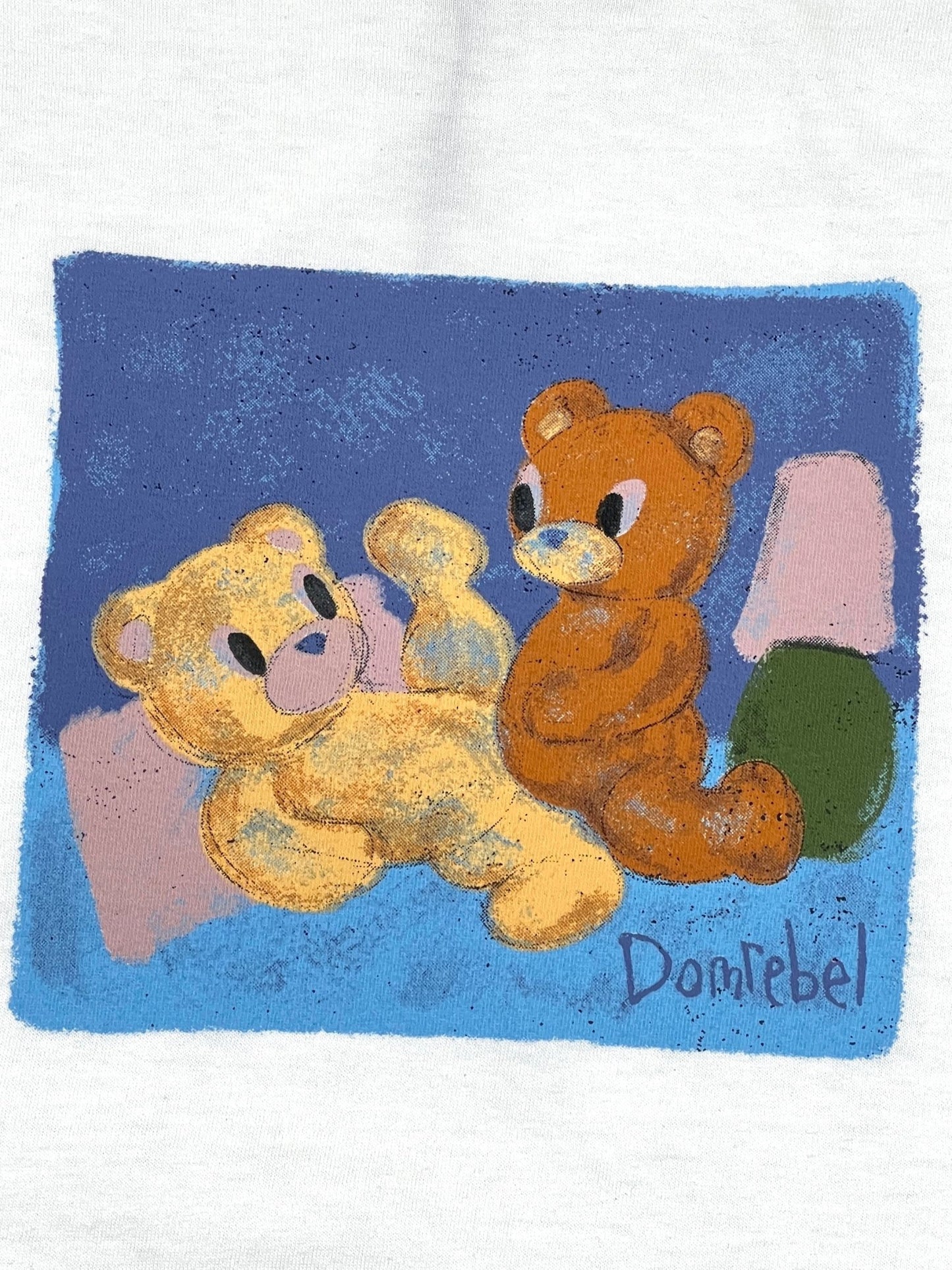 A drawing of two teddy bears on a DOMREBEL NOOKIE T-SHIRT IVORY by DOM REBEL.