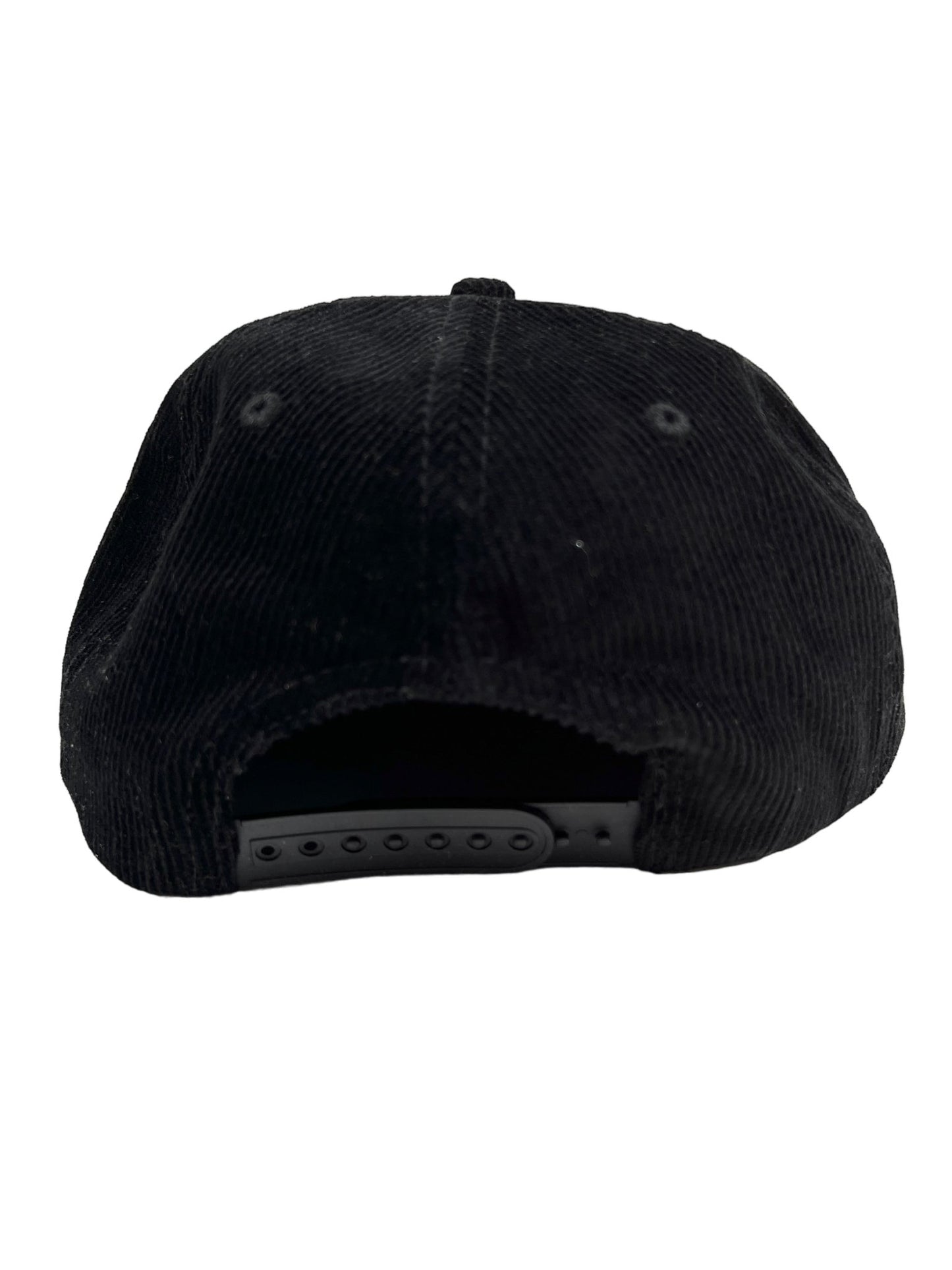 A PLEASURES black cotton corduroy snapback hat with an embroidered logo on a white background.