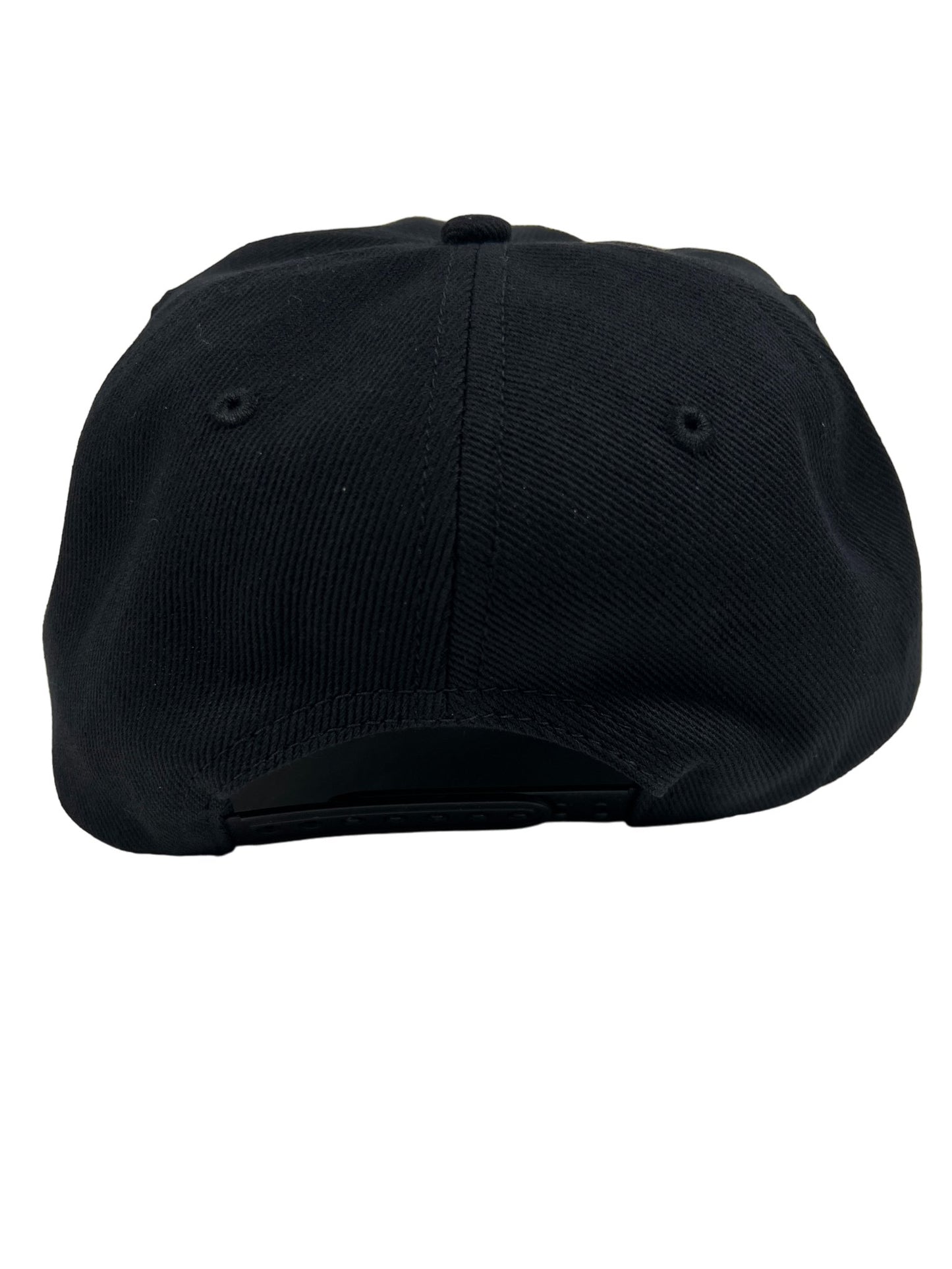 A trendy PLEASURES APPOINTMENT UNCONSTRUCTED SNAPBACK BLK hat on a white background.