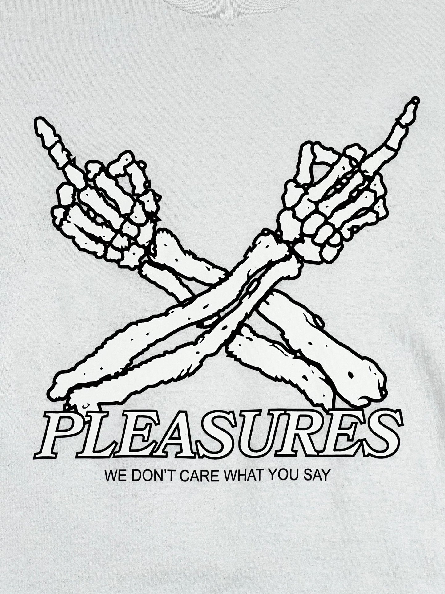 PLEASURES graphic t shirt: PLEASURES DON'T CARE T-SHIRT WHITE, crafted from comfortable cotton.