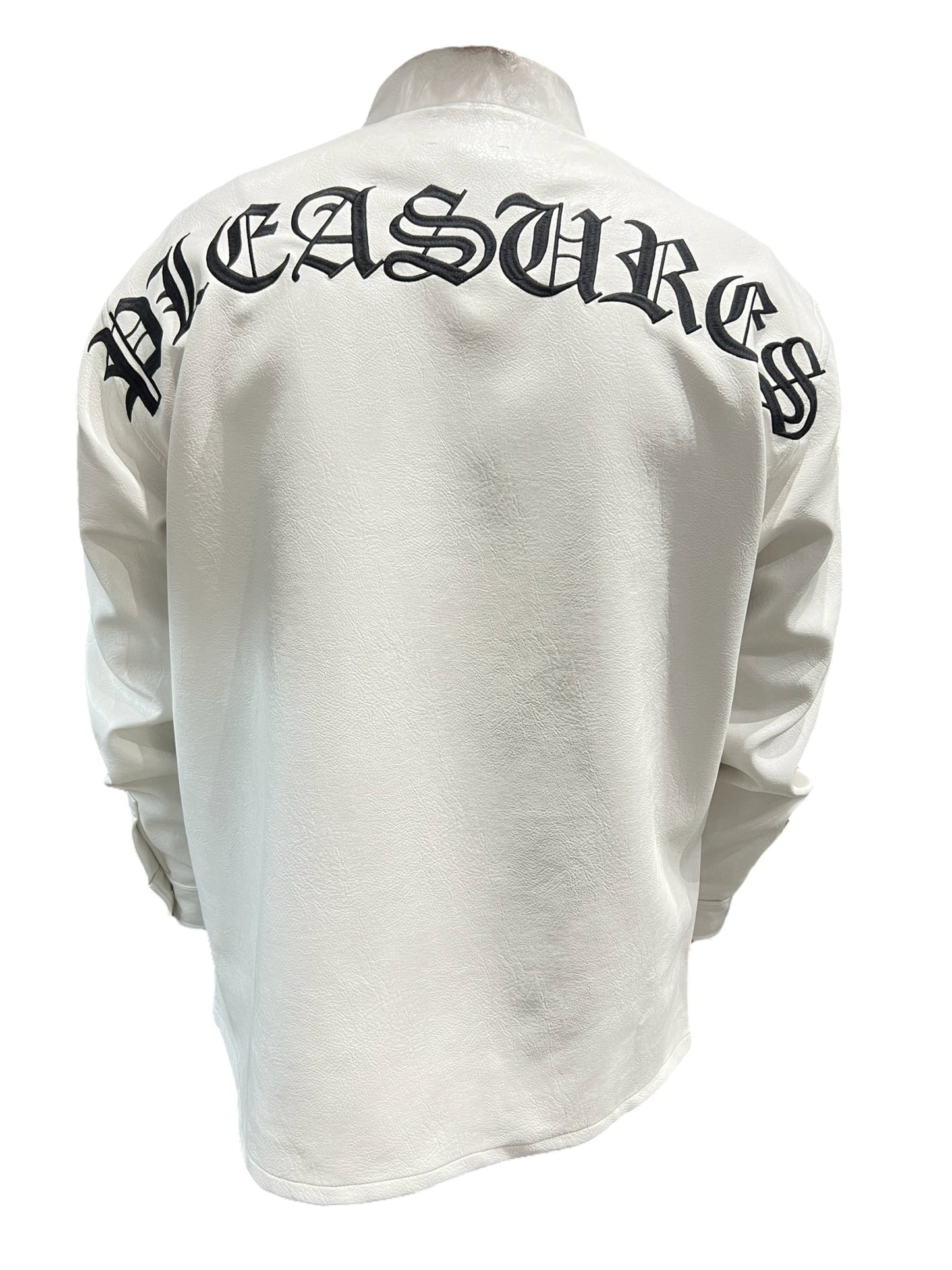 The back of a PLEASURES white overshirt with the word "treasures" embroidered on it.