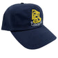 The Pleasures Soul Snapback Nvy by PLEASURES is a navy blue baseball cap with a yellow and white "Five 5 Pleasure" logo. It features an adjustable snap closure and is crafted from premium cotton as part of the exclusive Triple 5 Soul collaboration.