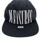 A PLEASURES denim ball cap with the word pleasures logo embroidered on it.
