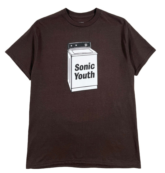 A brown graphic t-shirt with the word PLEASURES on it.