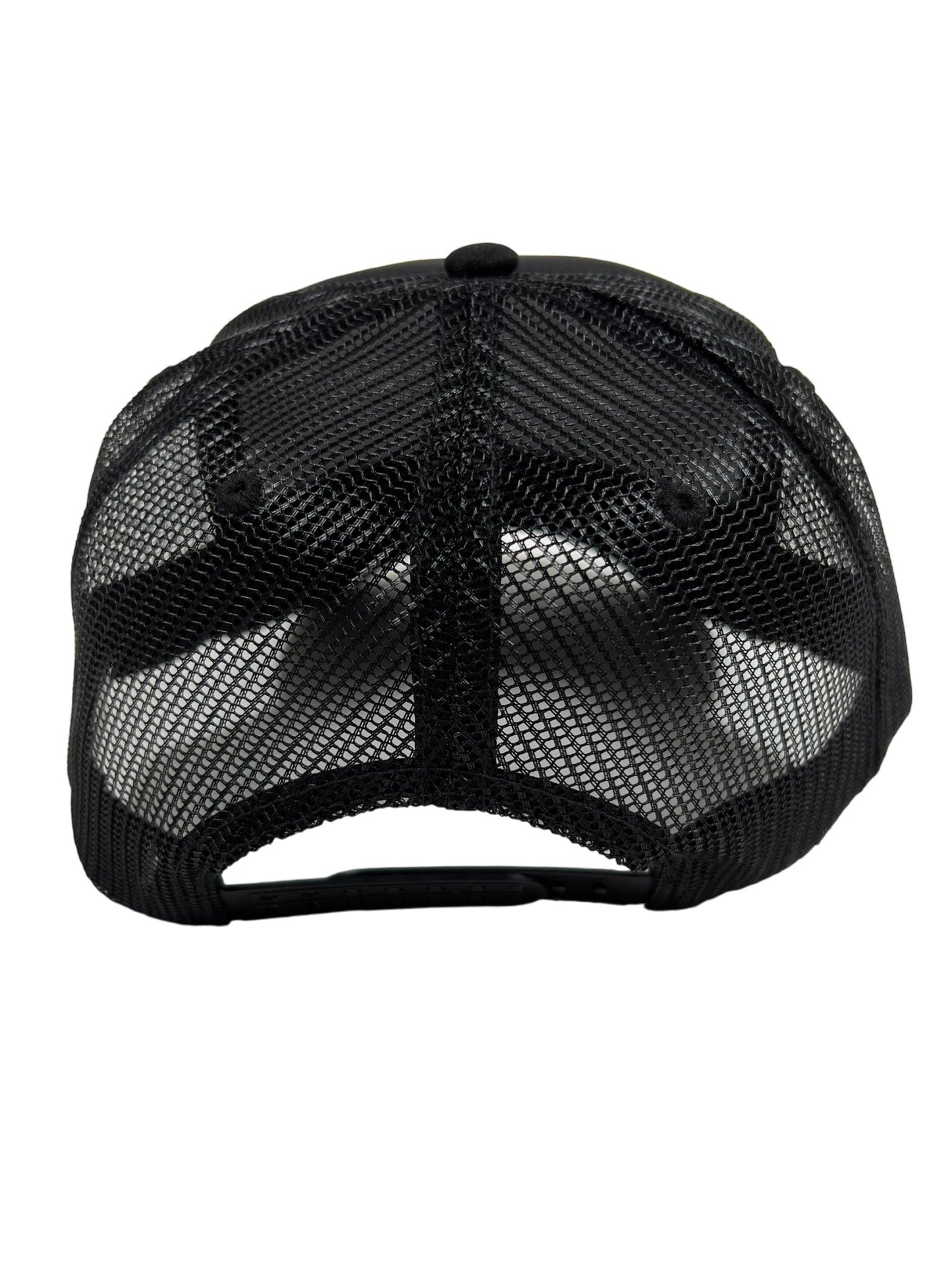 A black nylon mesh PLEASURES TWITCH TRUCKER CAP BLK with an adjustable snapback on a white background.