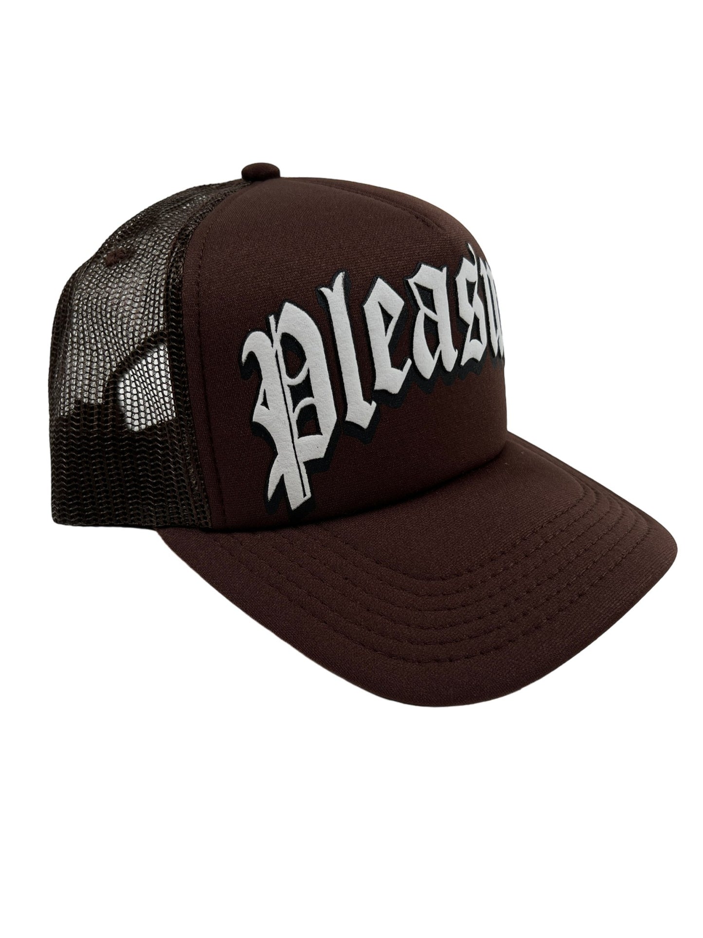 A brown polyester trucker hat with the PLEASURES TWITCH TRUCKER CAP BRW on it.
