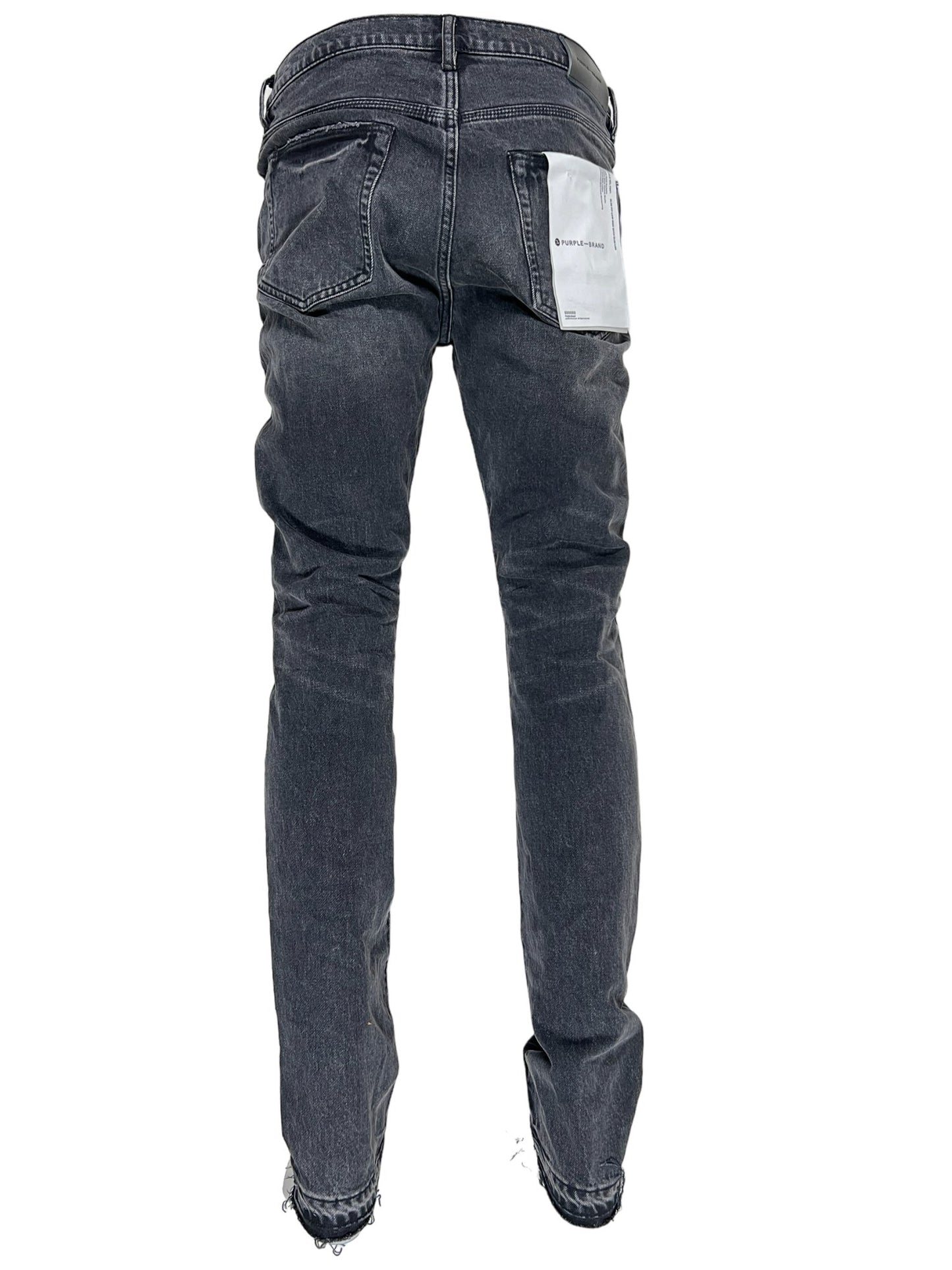 The back view of a pair of hand-faded, low rise skinny PURPLE BRAND P001-SHIB SHADOW INSEAM BLACK jeans.