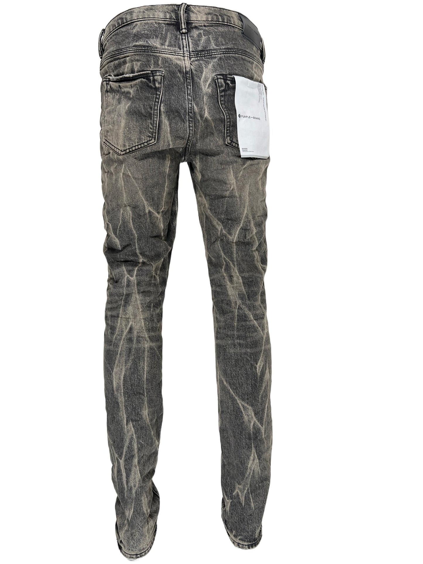 A pair of men's cotton jeans with a camouflage pattern in a faded wash by PURPLE BRAND JEANS P001-WBTA WASHED BLACK TIE ACID.