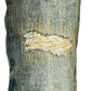 A pair of PURPLE BRAND P004-FDVA FLARED VINTAGE AFTERGLOW MID INDIGO jeans with holes in them.