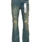 A pair of Purple Brand men's stretch denim jeans with a tag on them.