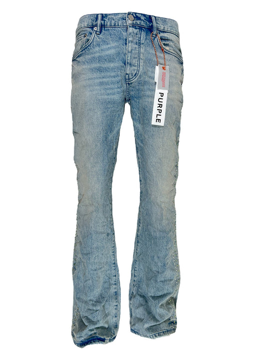 A pair of light blue wash jeans with a PURPLE BRAND P004-VNSL VINTAGE FLARE LIGHT INDIGO label attached standing against a white background.