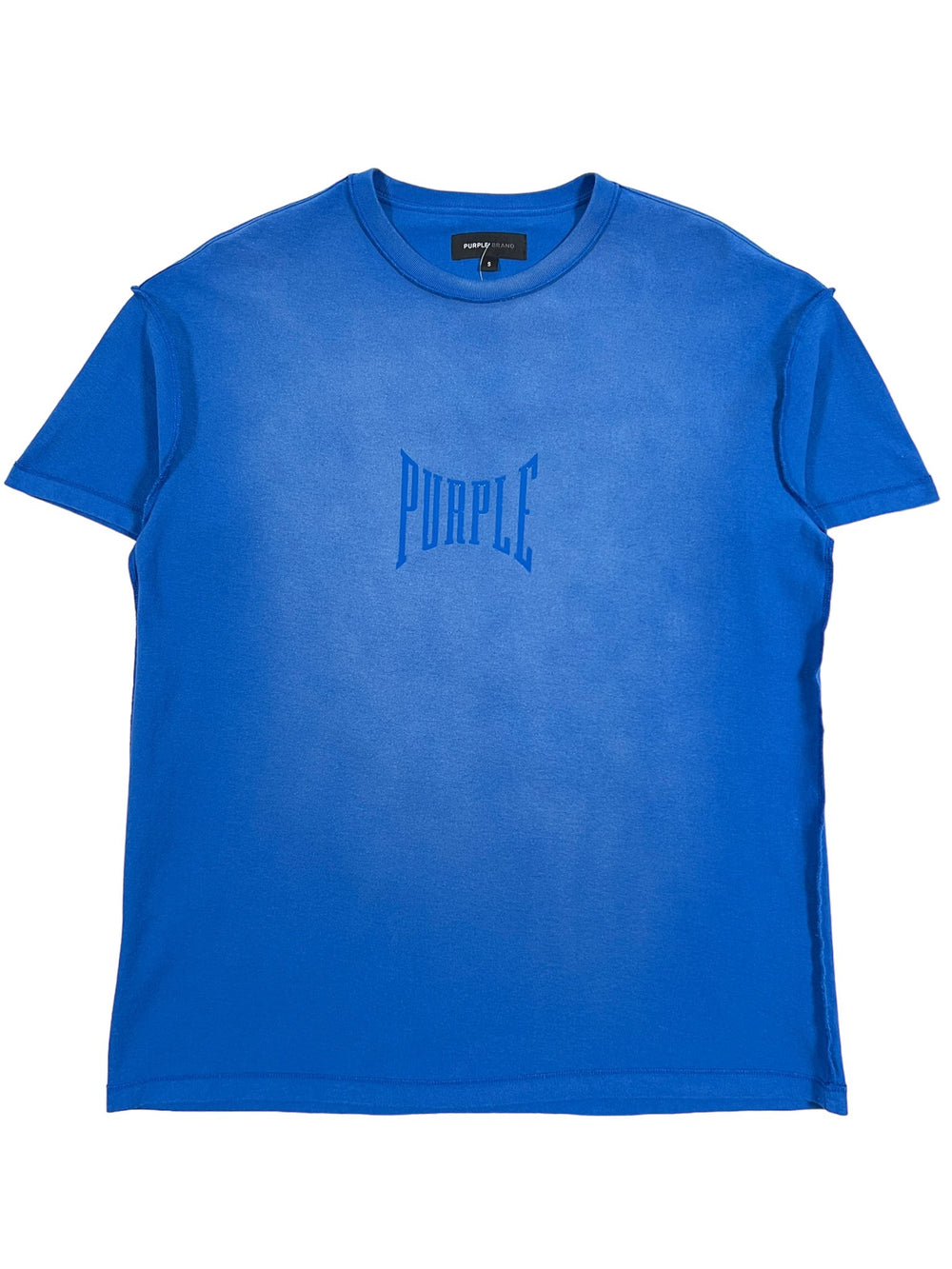 A PURPLE BRAND P101-JUCB TEXTURED INSIDE OUT TEE BLUE with the word purple on it.