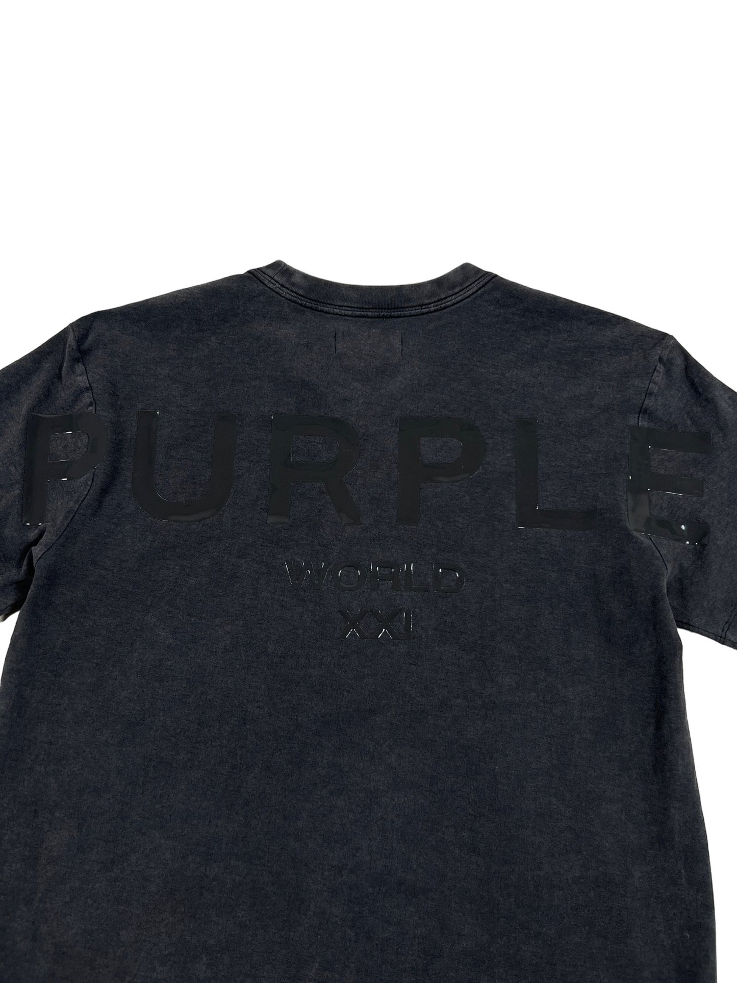 A black textured jersey short sleeve tee from PURPLE BRAND with the word "purple" in raised letters and "world xxi" below, displayed on a white background.