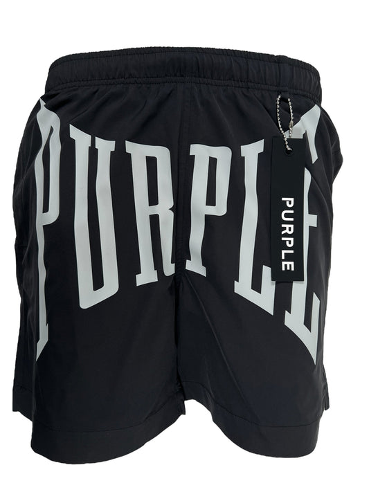 PURPLE BRAND P504-PBUC ALL ROUND SHORT BLACK swim trunks with the word "purple" printed in white letters, featuring a tag on the side.