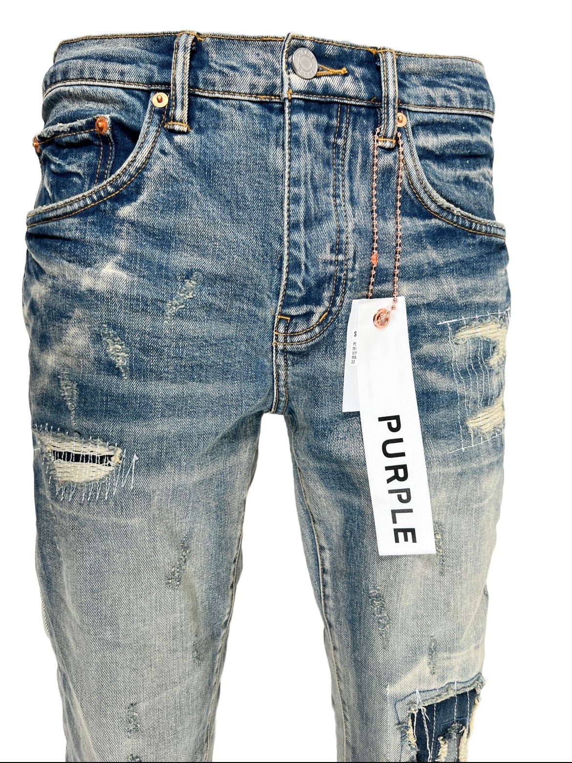 A pair of Purple Brand jeans with a tag on them.