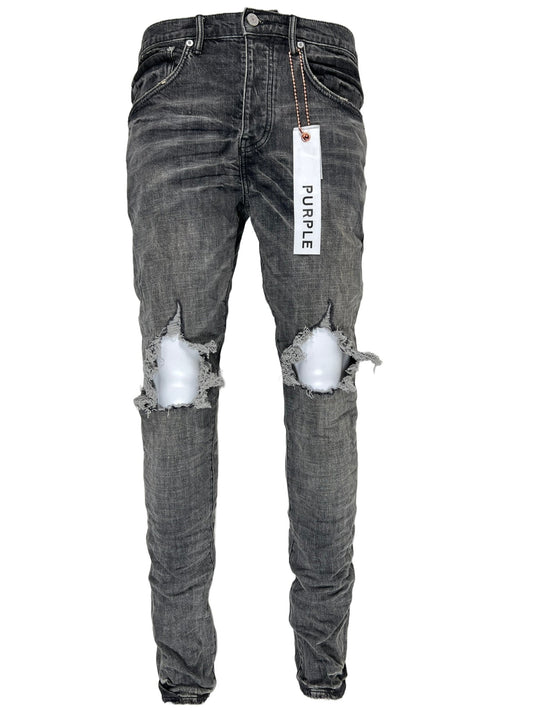 A pair of PURPLE BRAND P002-GEB grey dirty blowout jeans with a tag on them from the Purple Brand.