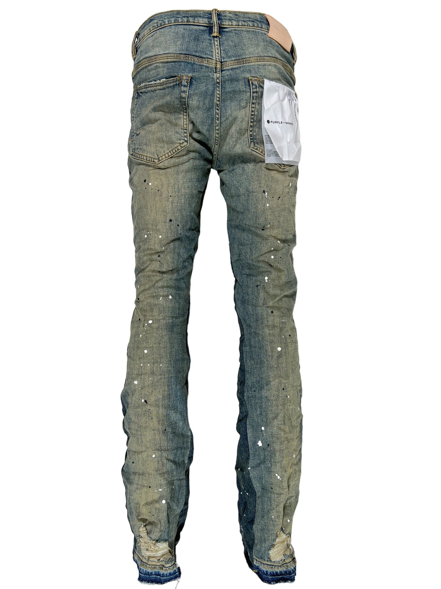 The back view of a pair of PURPLE BRAND JEANS P004-MIDD DOUBLE PANELS FLARE DESTROY INDIGO with paint splatters on them.