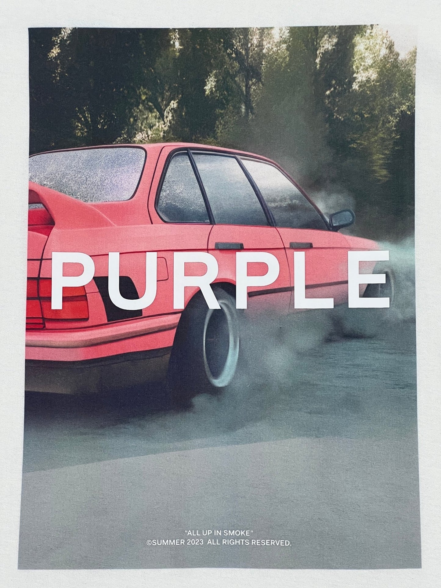 An image of a car with the word PURPLE on it, printed on a Purple Brand P104-QRCC823 Textured Jersey SS Tee Off White.