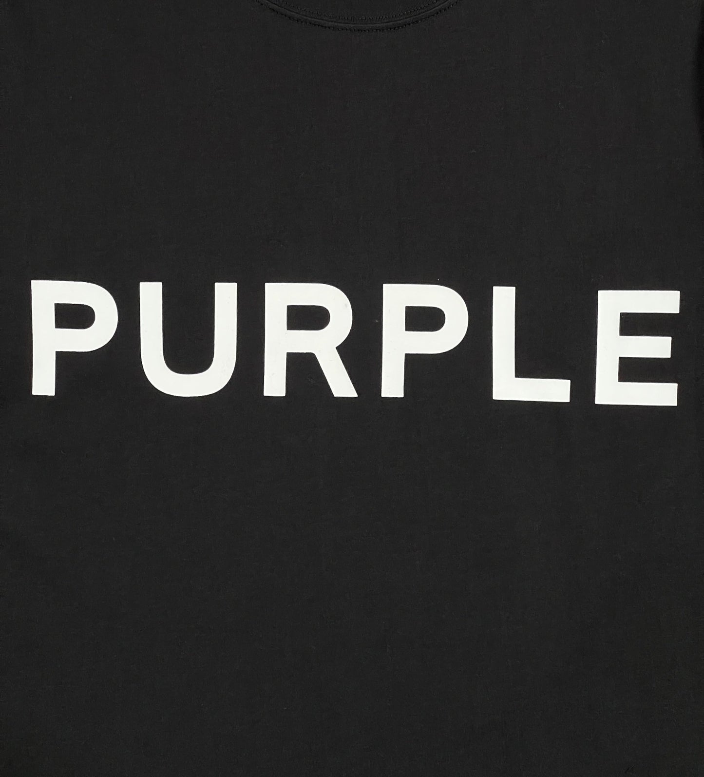 A black cotton t-shirt with the word "PURPLE" on it from the PURPLE BRAND P109-CBCT CLEAN JERSEY SS TEE BLK.