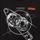 The Research T-Shirt Black/Black by PLEASURES is made from 100% cotton, showcasing white and red abstract gears and circles, with "PLEASURES" and "INTERNAL RESEARCH" elegantly printed on it.