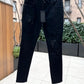 RH45 premium denim jeans with tags displayed outdoors.
