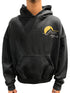 A man wearing a RHUDE AWAKENING HOODIE VTG BLACK with a yellow logo on it.