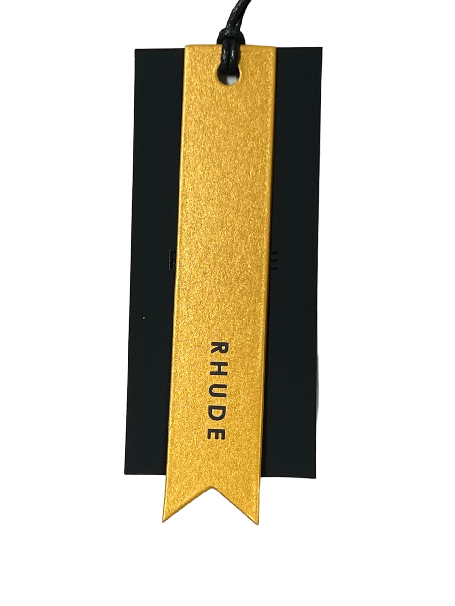 A gold and black clothing tag with the words "RHUDE Basketball swim shorts khaki" printed on it.