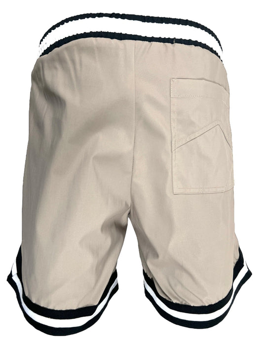 A pair of khaki RHUDE Basketball swim shorts with white and black striped trim and a back pocket.