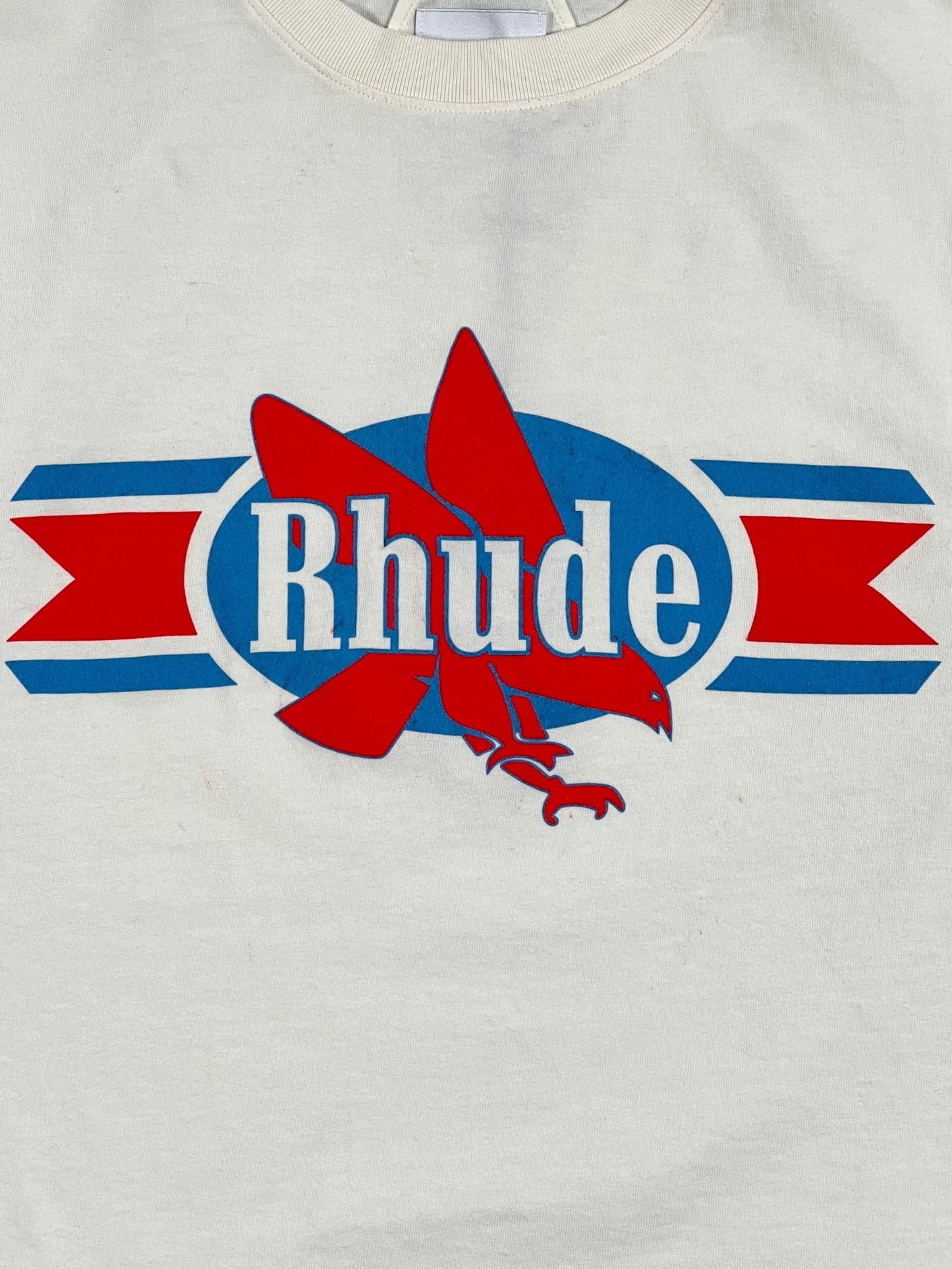 A RHUDE graphic t-shirt with the word RHUDE on it, Made In USA.