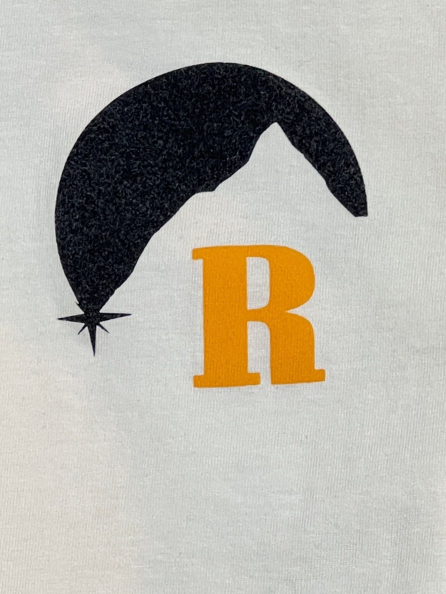 A RHUDE white cotton t-shirt with the letter r on it.