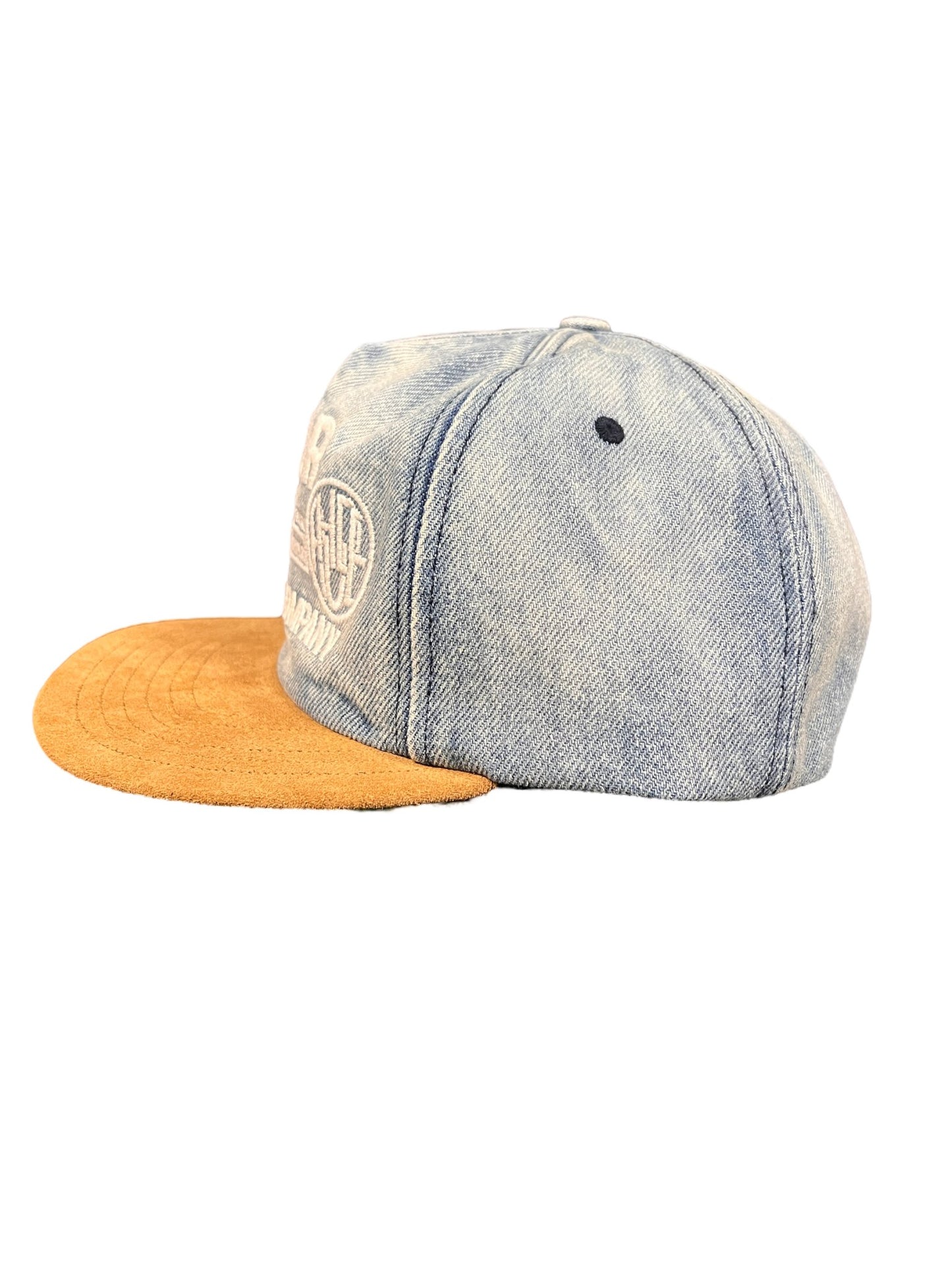 A RHUDE MOTOR OIL hat with an adjustable strap and a tan brim.