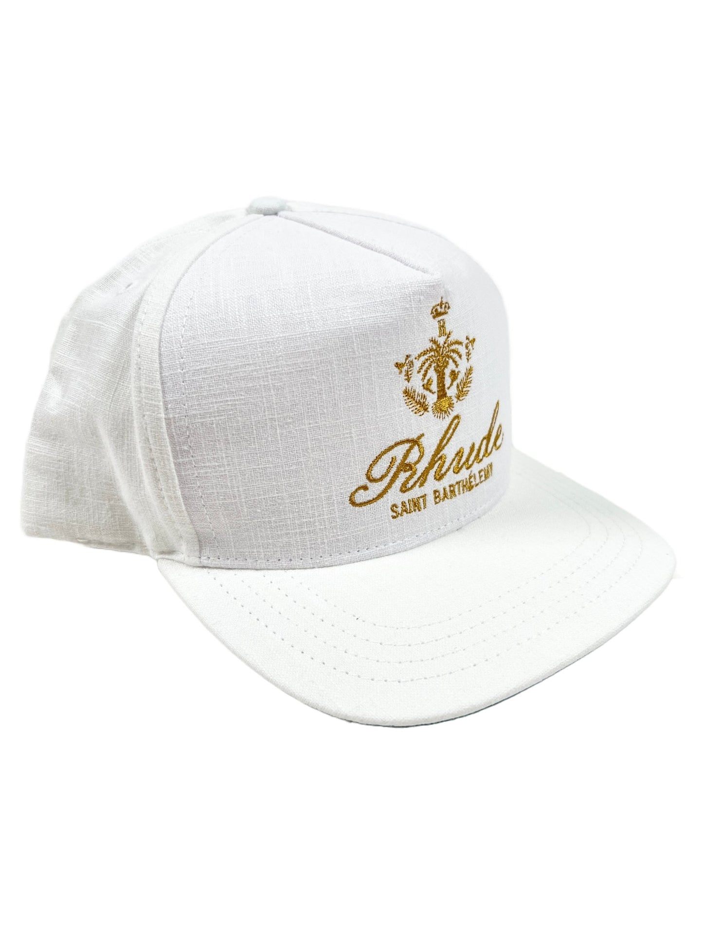 A white RHUDE ROSEWOOD HAT IVORY made of a polyester cotton blend with a gold logo on it.