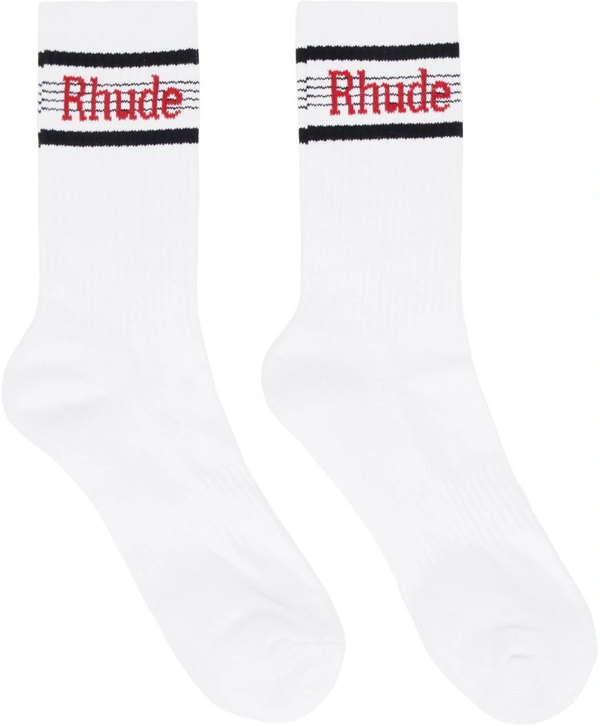 A pair of white stretch knit fabric socks with the RHUDE SPEED STRIPE SOCK WHT/BLK/RED logo on them.