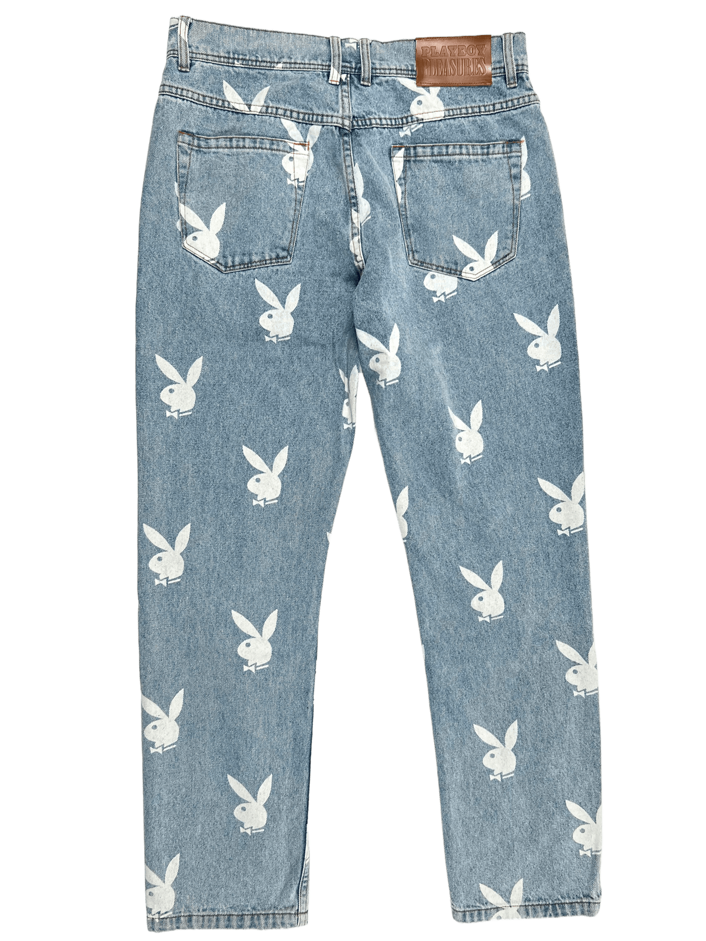 A pair of PLEASURES baggy fit jeans with a Playboy Bunny on them.
