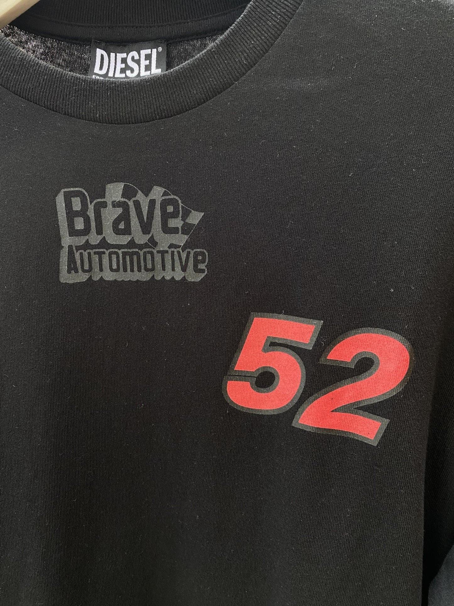 A DIESEL T-JUST-LS-C3 BLACK graphic t-shirt with the words "Brave Automotive" on it.