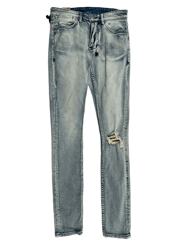 A pair of KSUBI light blue men's jeans KSUBI VAN WINKLE ROUND THREE DENIM with holes on the knees.