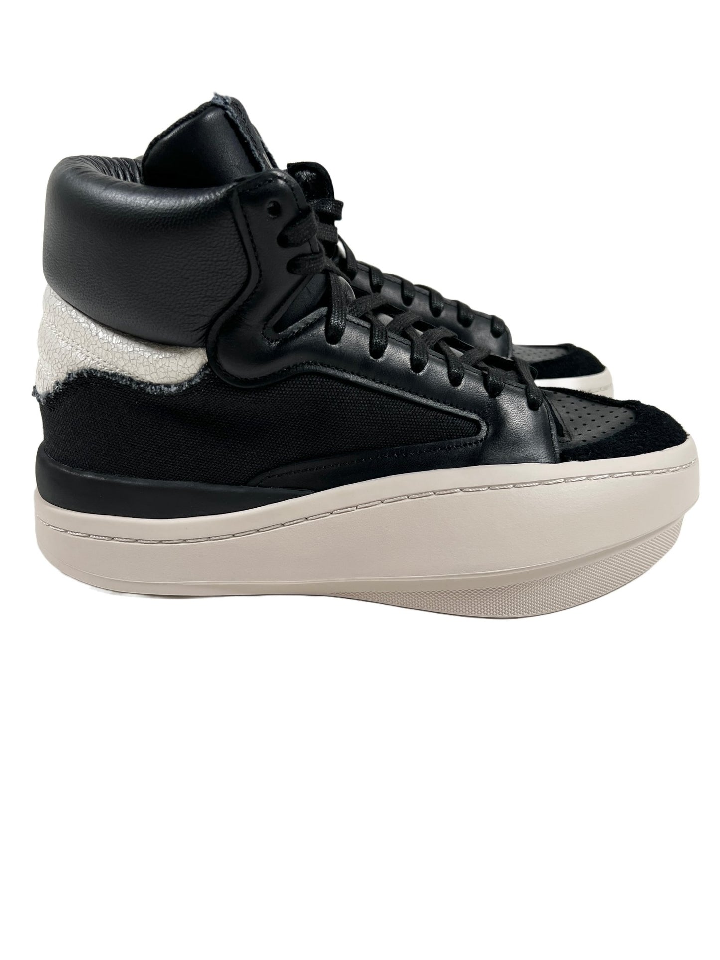 A ADIDAS x Y-3 black and white leather high top sneaker.