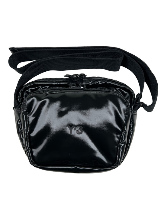 A black ADIDAS x Y-3 IJ9901 Y-3 X BODY BAG with an adjustable shoulder strap.
