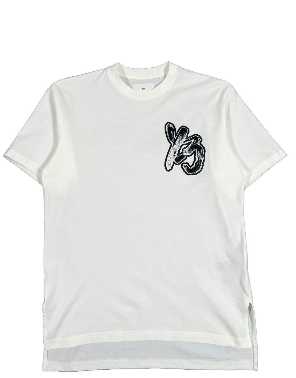 A Y-3 IM1791 BRUSH GFX SS TEE OFF WHITE with a black rubber logo print on it.
